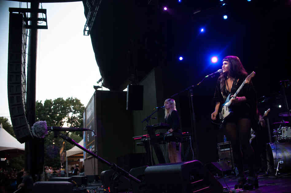 An NPR microphone at the front of the stage captured the noise of the crowd.