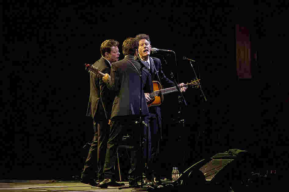 The band included fiddler Luke Bulla (left) and Keith Sewell on guitar and mandolin (center).