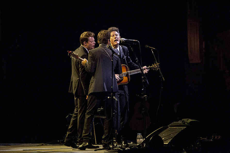 The band included fiddler Luke Bulla (left) and Keith Sewell on guitar and mandolin (center).