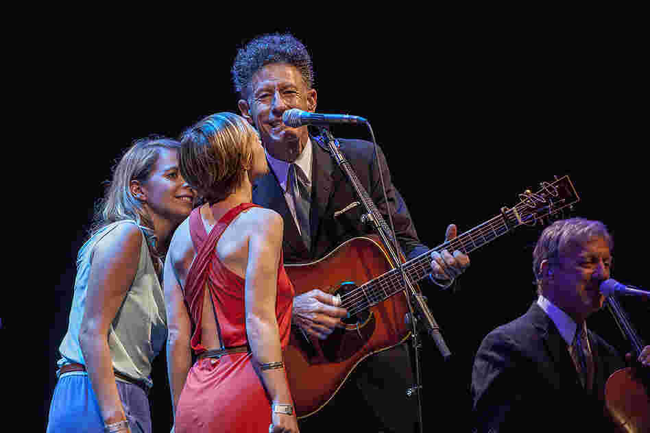 Singers Aoife O'Donovan (left) and Kat Edmondson harmonized with Lovett.