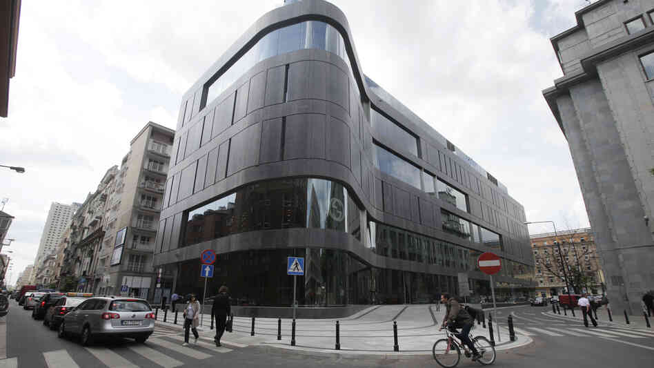 One of the latest additions to Poland's growing luxury goods market, the Wolf Bracka department store, beckons shoppers in the heart of the Polish capital,  Warsaw. The country's economy continues to grow, but Poles are anxiously watching the crisis in the eurozone.