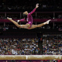 In an iconic moment, Gabrielle Douglas performs on the balance beam during the artistic gymnastics women's individual all-around competition at the 2012 Summer Olympics in London.