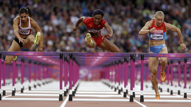 Turkey's Nevin Yanit (from left) United States' Kellie Wells and Russia's Tatyana Dektyareva compete in a women's 100-meter hurdles semifinal. Exactly how many yards is that?