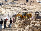 Israeli army tractors demolish a Palestinian home on Nov. 24, 2011, in the village of Yatta near Hebron, reported to be in Area C, an Israeli-controlled section of the West Bank. Recently, Israel has issued orders to evacuate and demolish more Palestinian communities in Area C, the largest section of the West Bank. Israeli army tractors demolish a Palestinian home on Nov. 24, 2011, in the village of Yatta near Hebron, reported to be in Area C, an Israeli-controlled section of the West Bank. Recently, Israel has issued orders to evacuate and demolish more Palestinian communities in Area C, the largest section of the West Bank.