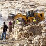 Israeli army tractors demolish a Palestinian home on Nov. 24, 2011, in the village of Yatta near Hebron, reported to be in Area C, an Israeli-controlled section of the West Bank. Recently, Israel has issued orders to evacuate and demolish more Palestinian communities in Area C, the largest section of the West Bank.