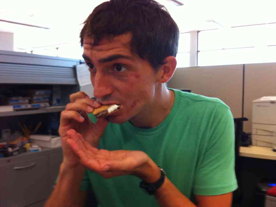 Ian always uses a "safety hand" to prevent any unnecessary sandwich loss.
