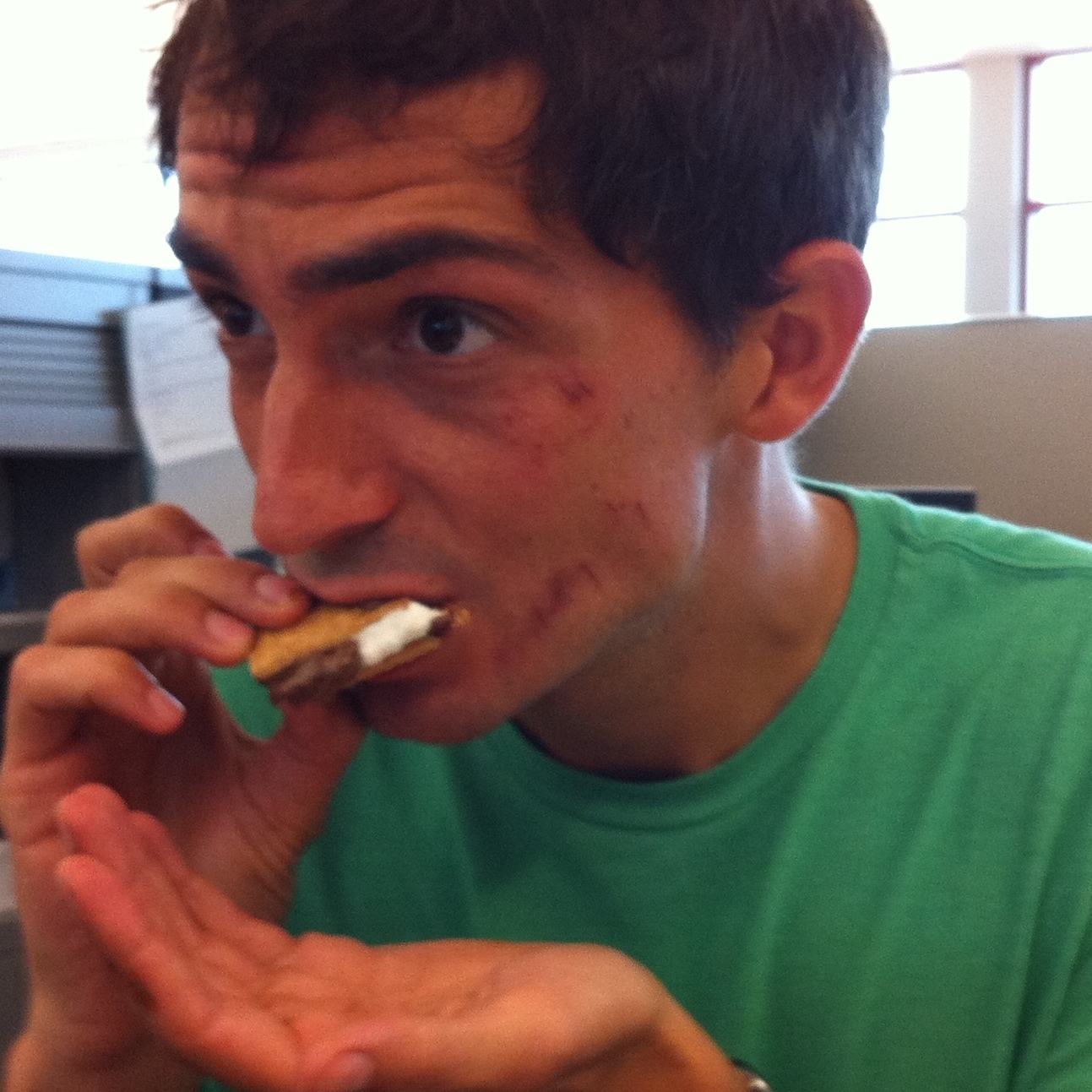 Ian always uses a "safety hand" to prevent any unnecessary sandwich loss.
