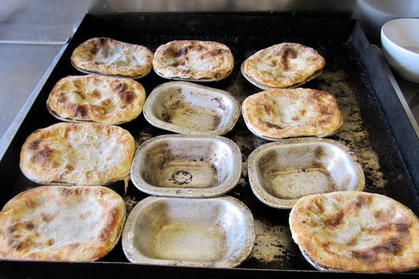 At F. Cooke's Pie and Mash Shop, Robert Cooke still uses the same pans his father cooked in.