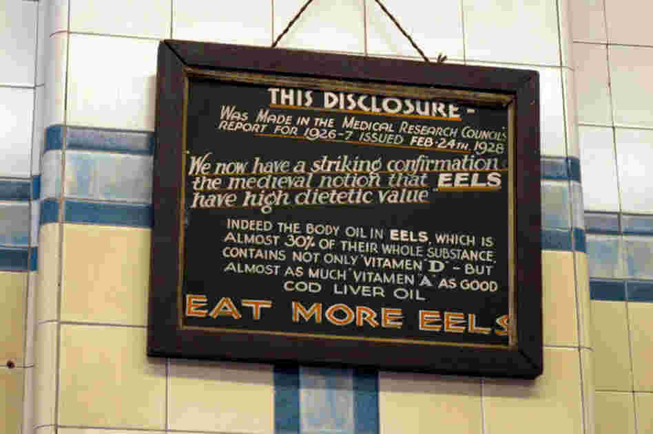 A sign on the wall at F. Cooke's shop in London.
