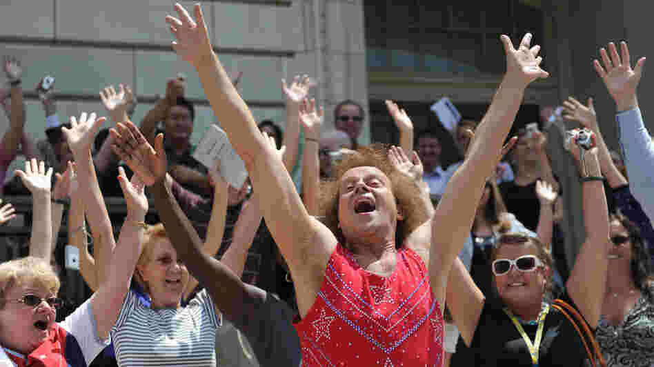 Fitness advocate Richard Simmons, wearing his signature shorts and tank top, leads Capitol Hill staff and visitors through an exercise routine July 24, 2008, in Washington, D.C. Fitness advocate Richard Simmons, wearing his signature shorts and tank top, leads Capitol Hill staff and visitors through an exercise routine July 24, 2008, in Washington, D.C.