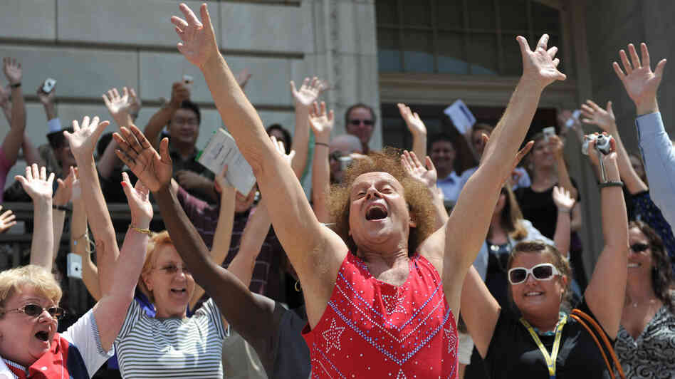 Fitness advocate Richard Simmons, wearing his signature shorts and tank top, leads Capitol Hill staff and visitors through an exercise routine July 24, 2008, in Washington, D.C. Fitness advocate Richard Simmons, wearing his signature shorts and tank top, leads Capitol Hill staff and visitors through an exercise routine July 24, 2008, in Washington, D.C.