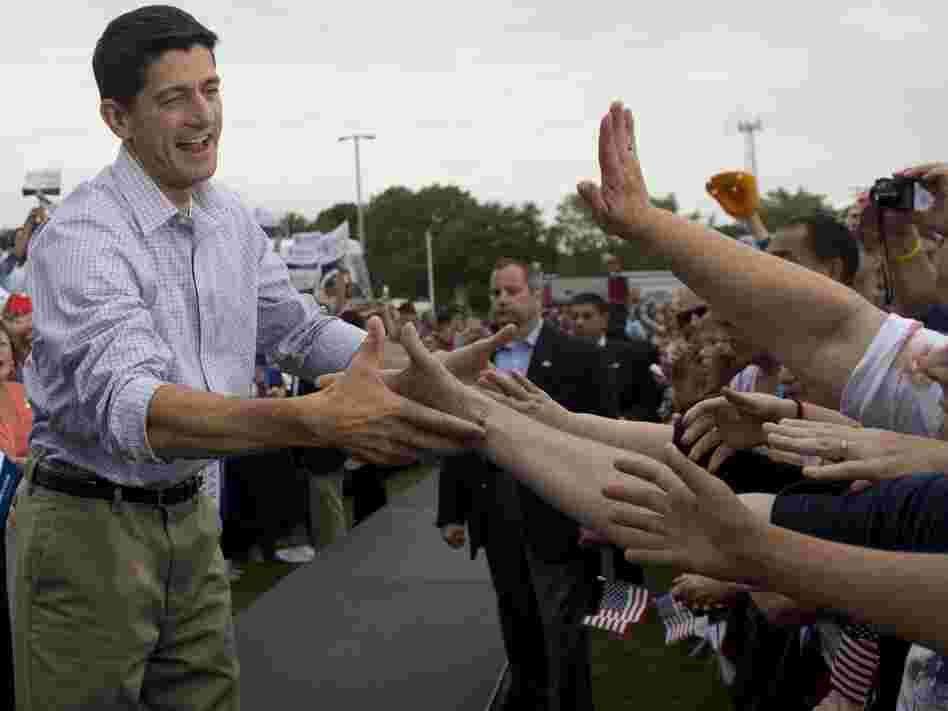 Rep. Paul Ryan, who has been chosen by Mitt Romney to be his running mate on the GOP ticket, greeting supporters Sunday in his home state of Wisconsin. Ryan will be in Iowa today.
