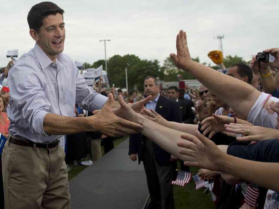 Rep. Paul Ryan, who has been chosen by Mitt Romney to be his running mate on the GOP ticket, greeting supporters Sunday in his home state of Wisconsin. Ryan will be in Iowa today.