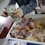 A student at Fairmeadow Elementary School buys fruits and vegetables in Palo Alto, Calif., in 2010. A student at Fairmeadow Elementary School buys fruits and vegetables in Palo Alto, Calif., in 2010.