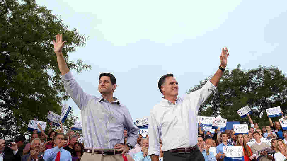 Republican presidential candidate Mitt Romney (right) and running mate Rep. Paul Ryan of Wisconsin greet supporters during a homecoming campaign rally Sunday in Waukesha, Wis.
