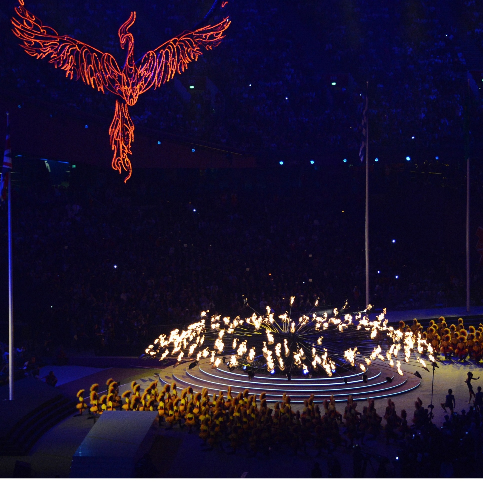 Three photos show the Olympic flame slowly extinguishing at London's Olympic Stadium, as the London 2012 Games come to an end. The next Summer Olympics will be in Rio de Janeiro, Brazil.