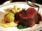 The entree course of filet mignon, polenta ravioli with cauliflower and vadouvan butter, whole roasted zucchini blossom, bloomsdale spinach, and pinot noir sauce that will be served at the 2009 Creative Arts and 61st Primetime Emmy Governors Balls is seen during a news conference in Los Angeles on Thursday, Aug. 20, 2009. (AP Photo/Matt Sayles) The entree course of filet mignon, polenta ravioli with cauliflower and vadouvan butter, whole roasted zucchini blossom, bloomsdale spinach, and pinot noir sauce that will be served at the 2009 Creative Arts and 61st Primetime Emmy Governors Balls is seen during a news conference in Los Angeles on Thursday, Aug. 20, 2009. (AP Photo/Matt Sayles)