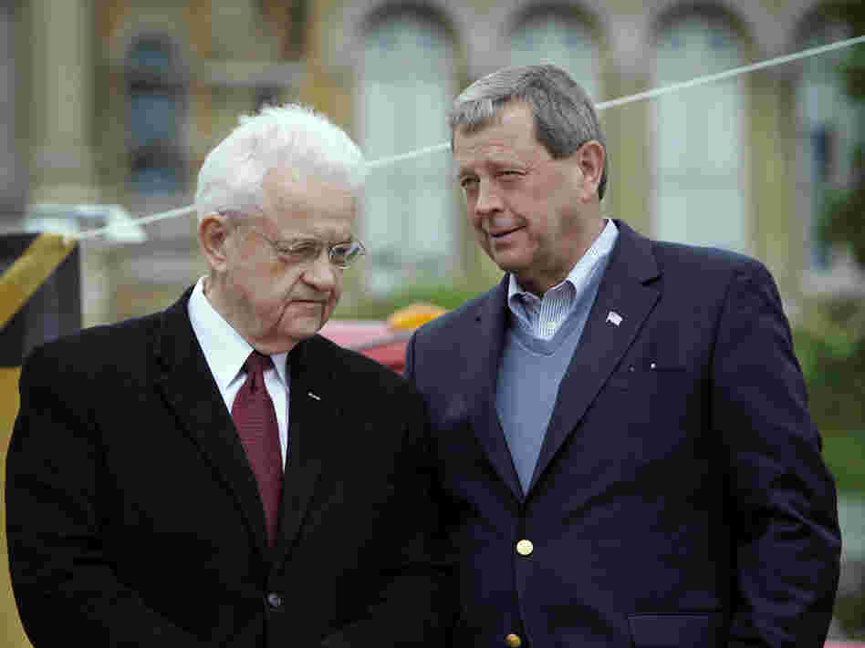 Democratic Rep. Leonard Boswell (left) talks with Republican Rep. Tom Latham on May 7, 2010, in Des Moines, Iowa. Redistricting is now pitting the longtime Iowa congressmen in a general election battle. Democratic Rep. Leonard Boswell (left) talks with Republican Rep. Tom Latham on May 7, 2010, in Des Moines, Iowa. Redistricting is now pitting the longtime Iowa congressmen in a general election battle.