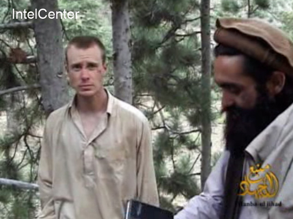 This image provided by IntelCenter on Dec. 8, 2010, shows a frame grab from a video released by the Taliban containing footage of a man believed to be Sgt. Bowe Bergdahl. The 26-year-old Army sergeant was captured by the Taliban more than three years ago.