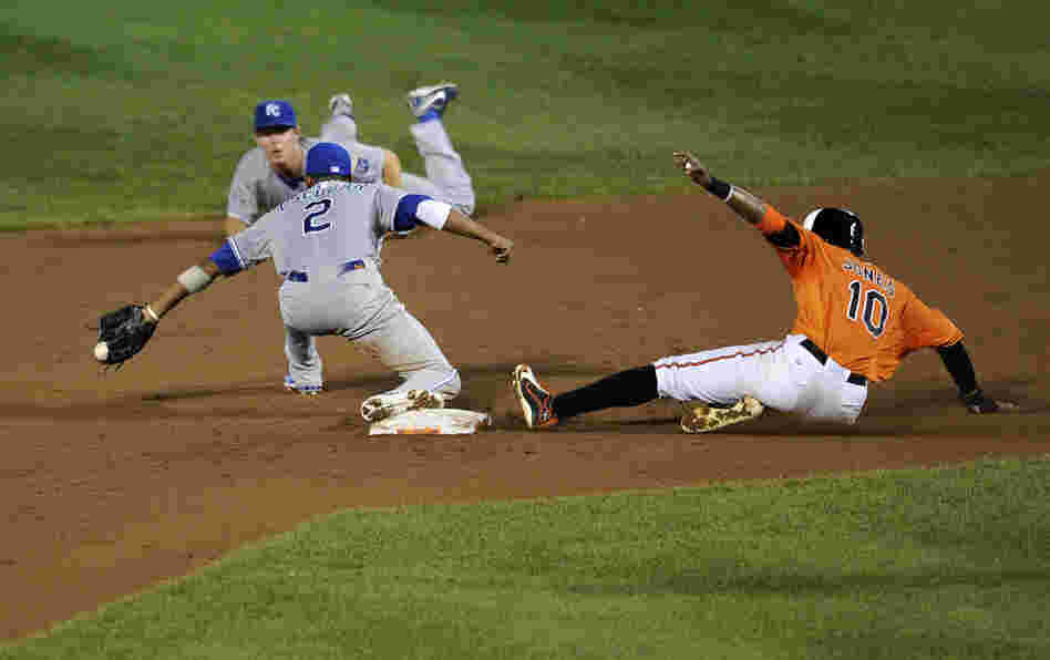 Baltimore Orioles center fielder Adam Jones is out at second against Kansas City Royals shortstop Alcides Escobar. Despite less-than-stellar statistics, the Orioles are contenders in the American League wild-card race.