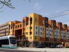 A Metro Light Rail train rolls by the Devine Legacy apartment building along Central Avenue in Phoenix. The energy-efficient complex includes 65 "urban style" apartments. A Metro Light Rail train rolls by the Devine Legacy apartment building along Central Avenue in Phoenix. The energy-efficient complex includes 65 "urban style" apartments.