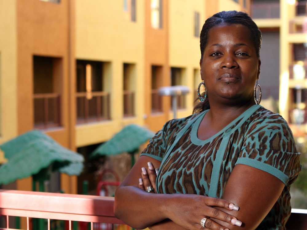 Felicia McMullen has lived in the energy-efficient Devine Legacy apartment building in central Phoenix since December.