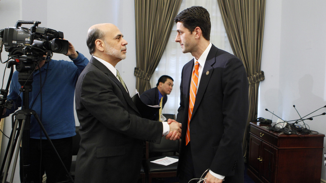 House Budget Committee Chairman Paul Ryan, R-Wis., shakes hands with Federal Reserve Chairman Ben Bernanke at the close of the committee's hearing on the state of the economy in February 2011.