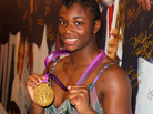 Olympian Claressa Shields visits the USA House in London before leaving for her home in Flint, Mich. Shields was greeted by a marching band and a motorcycle escort in her hometown. Olympian Claressa Shields visits the USA House in London before leaving for her home in Flint, Mich. Shields was greeted by a marching band and a motorcycle escort in her hometown.