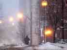 A pedestrian walks through falling snow in Pittsburgh on Jan. 12, 2011. A pedestrian walks through falling snow in Pittsburgh on Jan. 12, 2011.