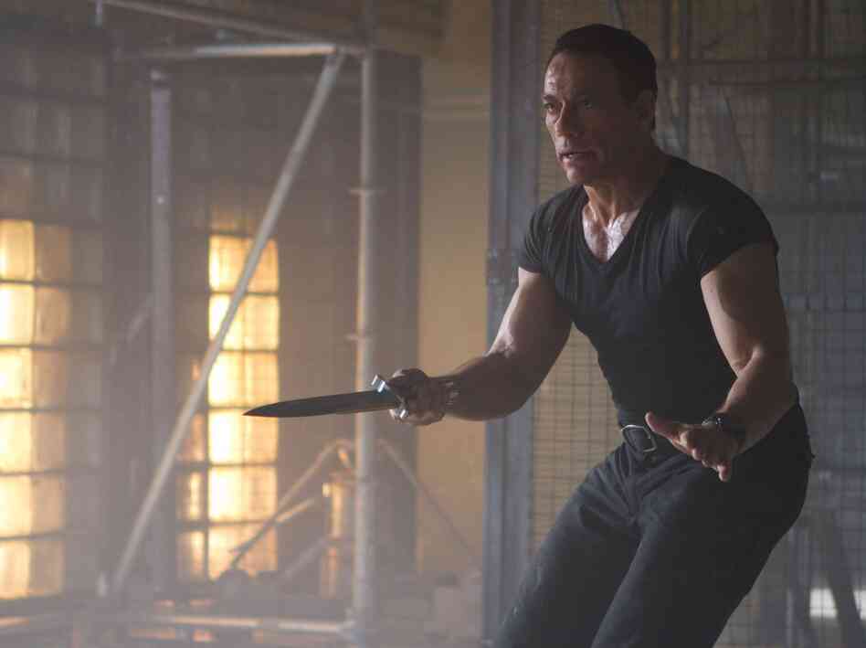Jean-Claude Van Damme plays the aptly named Jean Vilain — he's the bad guy, see? — in the sequel to 2010's blockbuster hit.