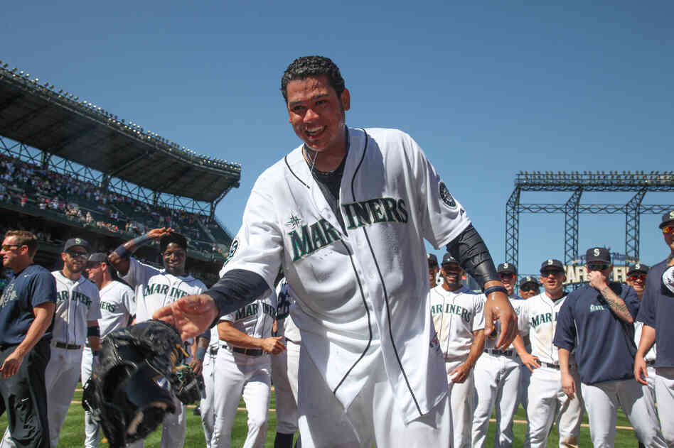 Starting pitcher Felix Hernandez of the Seattle Mariners was dowsed with water after throwing a perfect game against the Tampa Bay Rays at Safeco Field in Seattle.