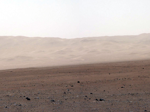 A network of valleys believed to have formed by water erosion enters Mars' Gale Crater from the outside. This image of the crater wall is north of the landing site, or behind the rover Curiosity.