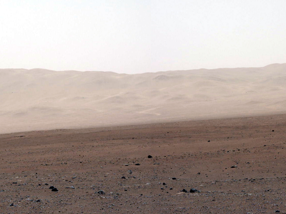 A network of valleys believed to have formed by water erosion enters Mars' Gale Crater from the outside. This image of the crater wall is north of the landing site, or behind the rover Curiosity.