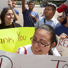 Ricky Campos, 23, and Katye Hernandez, 22, both illegal immigrants from El Salvador who live in Silver Spring, Md., hold signs saying "Thank You President Obama" after he announced the new policy in June. Ricky Campos, 23, and Katye Hernandez, 22, both illegal immigrants from El Salvador who live in Silver Spring, Md., hold signs saying "Thank You President Obama" after he announced the new policy in June.