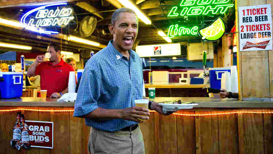President Barack Obama gets a beer and a pork chop as he visits the Iowa State Fair in Des Moines. Earlier, the president gave a man at a coffee shop a bottle of the White House's home brew.