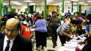 Potential applicants for President Obama's deferred action program gather at St. Mary's Church in New York for a workshop and legal advice.