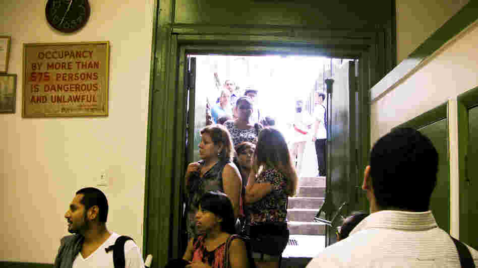 Potential applicants line up for counseling sessions on President Obama's "deferred action" program at St. Mary's Church in New York. Potential applicants line up for counseling sessions on President Obama's "deferred action" program at St. Mary's Church in New York.