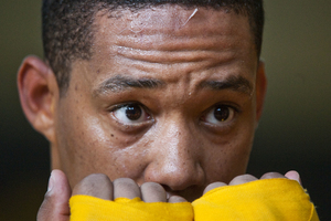 Cunningham demonstrates a defensive technique.