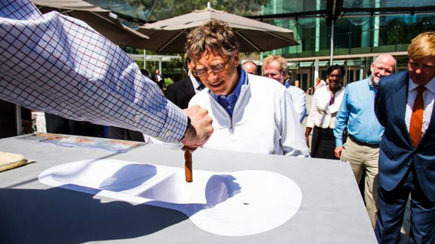 Bill Gates, co-founder of the the Bill & Melinda Gates Foundation, checks out a toilet demo at the Reinvent the Toilet Fair in Seattle, Wash. The festival featured prototypes of high-tech toilets developed by researchers around the world.