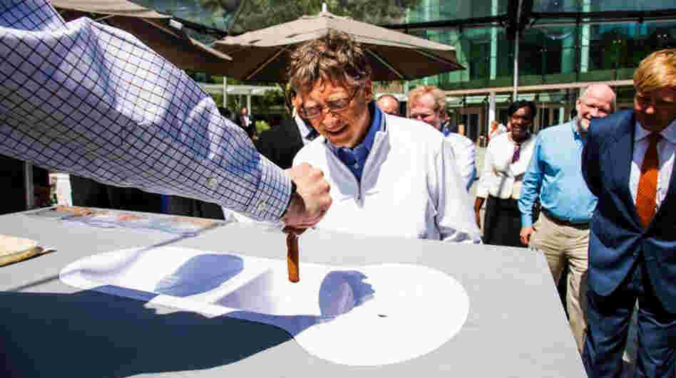 Bill Gates, co-founder of the the Bill & Melinda Gates Foundation, checks out a toilet demo at the Reinvent the Toilet Fair in Seattle, Wash. The festival featured prototypes of high-tech toilets developed by researchers around the world.