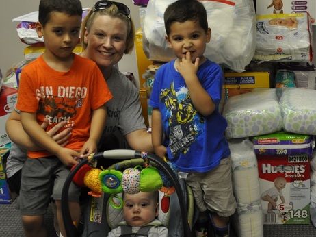 Kerry Rodriguez and her three sons organized a diaper drive for HappyBottoms at their church. Kerry Rodriguez and her three sons organized a diaper drive for HappyBottoms at their church.