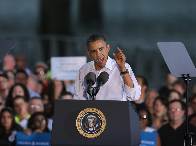 President Barack Obama speaks to voters during a campaign stop at the Waterloo Center for the Arts on August 14 in Waterloo, Iowa. The stop was part of a three-day, nine-city campaign trip across Iowa.