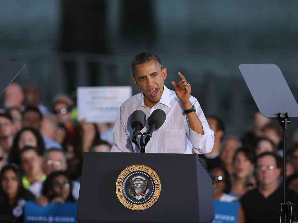 President Barack Obama speaks to voters during a campaign stop at the Waterloo Center for the Arts on August 14 in Waterloo, Iowa. The stop was part of a three-day, nine-city campaign trip across Iowa.