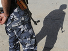 A Syrian soldier casts a shadow as he stands in the northwest city of Idlib in May. Growing numbers of Syrian soldiers are defecting and joining the rebels. A Syrian soldier casts a shadow as he stands in the northwest city of Idlib in May. Growing numbers of Syrian soldiers are defecting and joining the rebels.