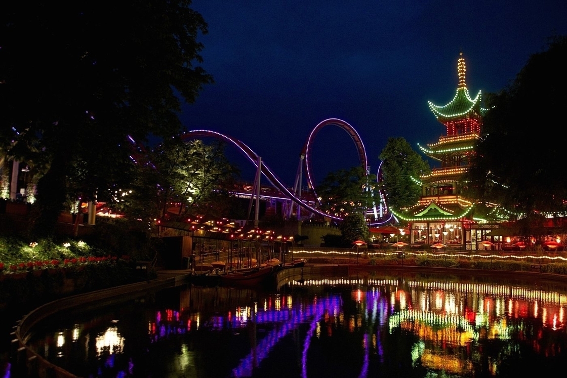 Tivoli Gardens, one of the world's oldest amusement parks, has been a landmark in Copenhagen, Denmark, since the middle of the 19th century. It remains hugely popular, particularly on summer nights.