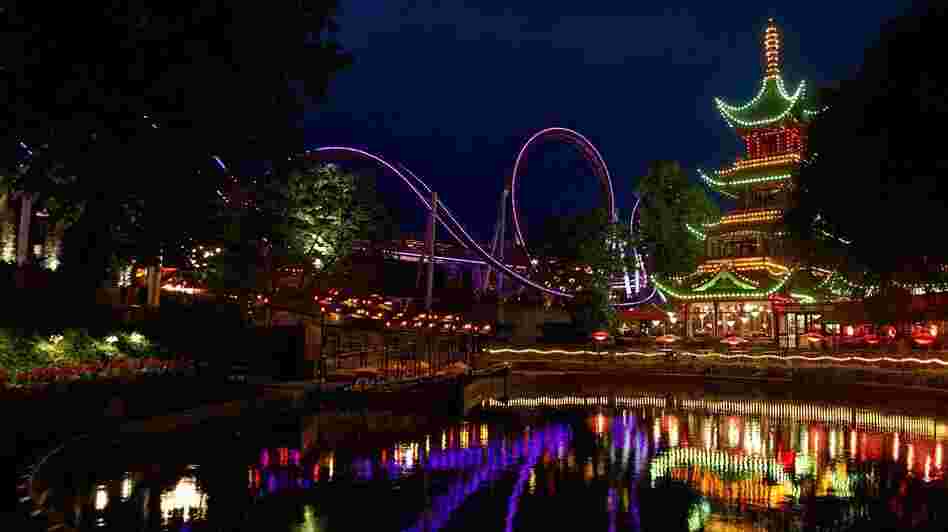 Tivoli Gardens, one of the world's oldest amusement parks, has been a landmark in Copenhagen, Denmark, since the middle of the 19th century. It remains hugely popular, particularly on summer nights.