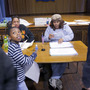 Pennsylvania voters show identification as they sign in to vote during the Republican primary in Philadelphia in April. Pennsylvania voters show identification as they sign in to vote during the Republican primary in Philadelphia in April.