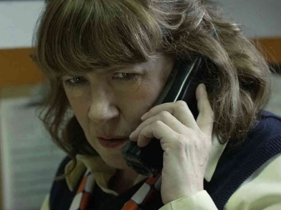 Ann Dowd plays Sandra, manager of an Ohio "Chickwich" franchise. A victim of the scam, she's also an agent in Becky's violation.