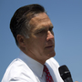 Republican presidential candidate Mitt Romney writes on a whiteboard during a news conference Thursday in Greer, S.C.