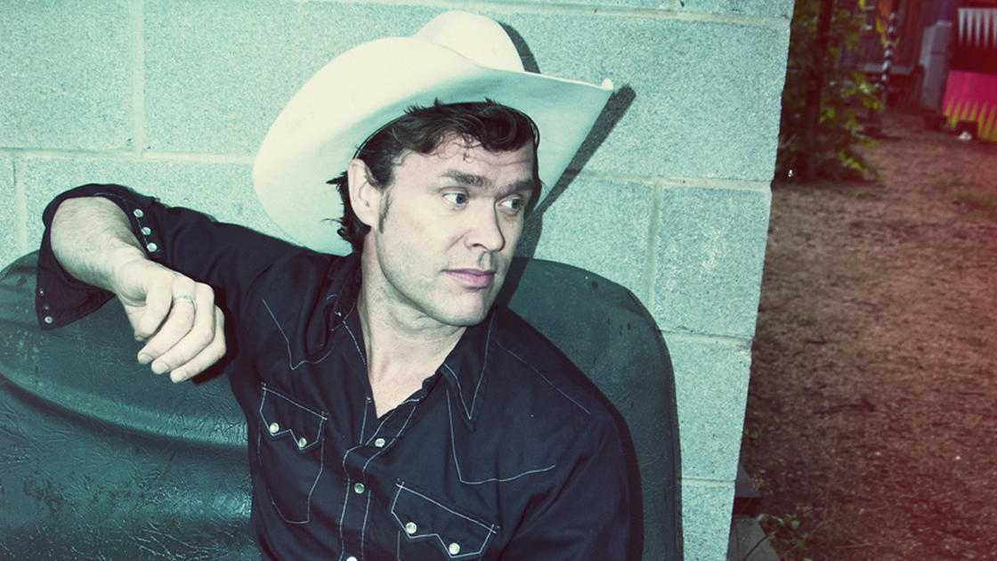 Corb Lund, who wrote most of Cabin Fever, his new album, in a cabin he built himself.